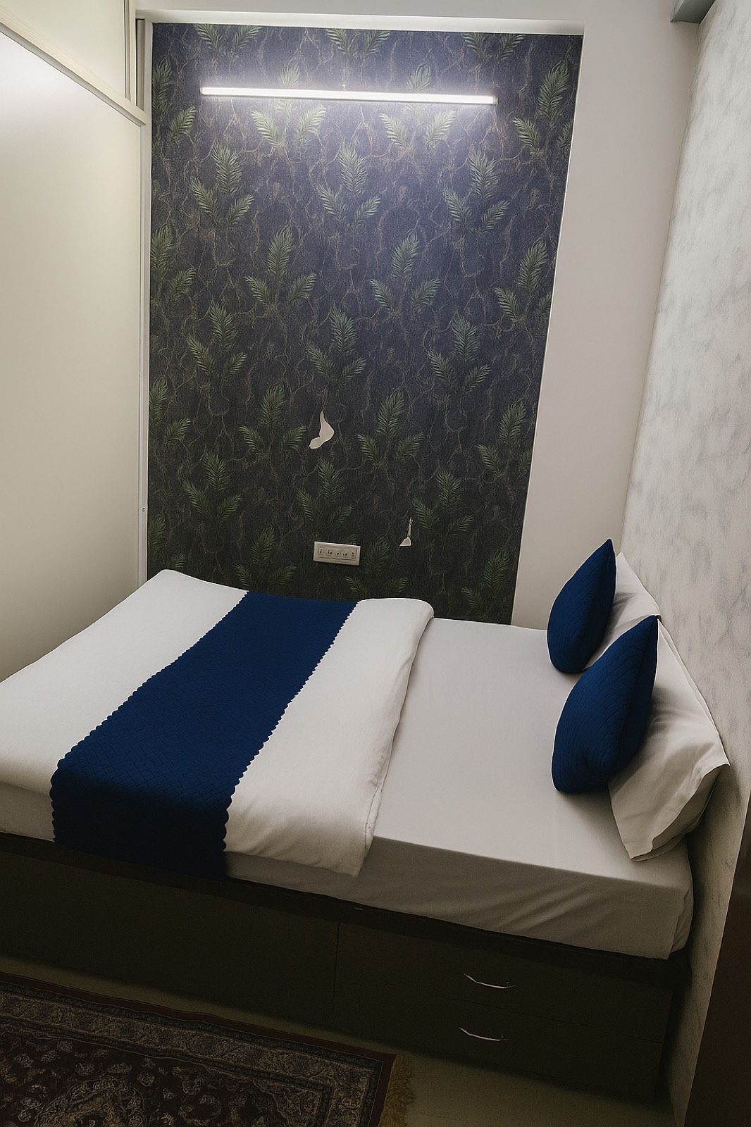 Dev Hotel Mansarovar blue bed room